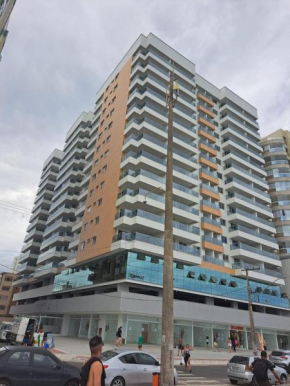 Lindo apartamento na praia do morro com vista para o mar, espaçoso, prédio novinho